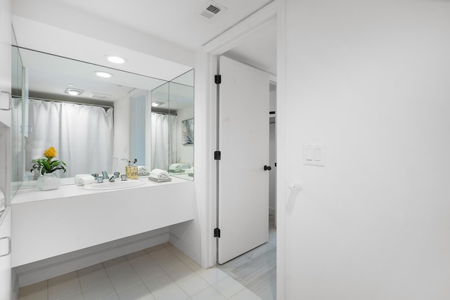 full bath with tile patterned floors, visible vents, recessed lighting, and vanity