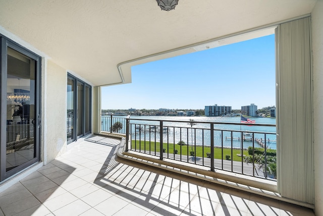 balcony featuring a water view