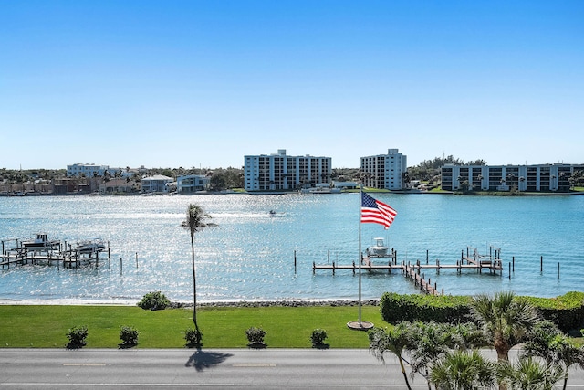 exterior space featuring boat lift and a boat dock