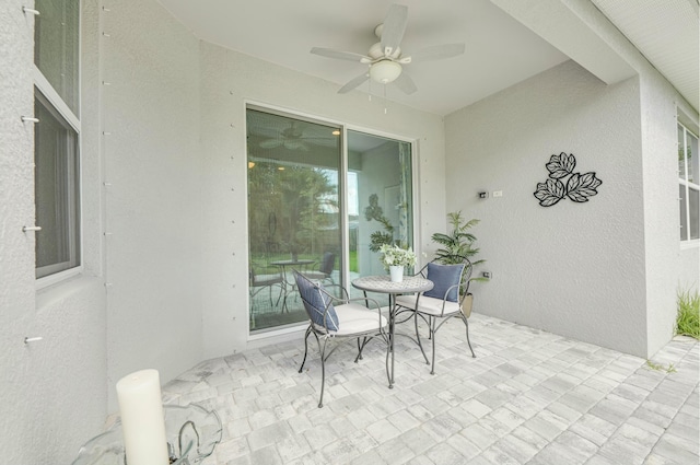 view of patio / terrace with a ceiling fan