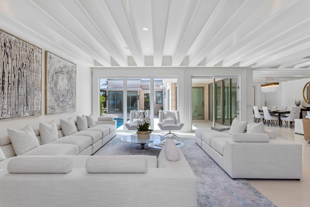 living area featuring beamed ceiling