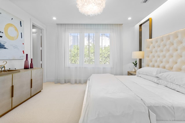 bedroom featuring recessed lighting and carpet