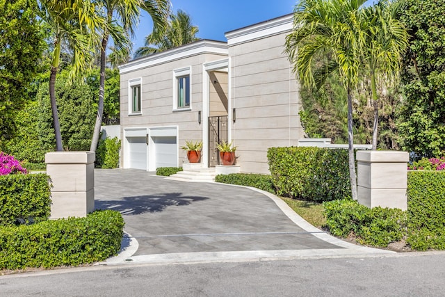 view of front of property with an attached garage and driveway