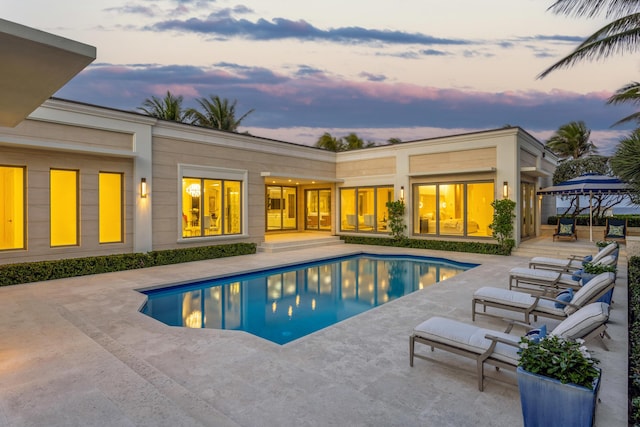 pool with a patio