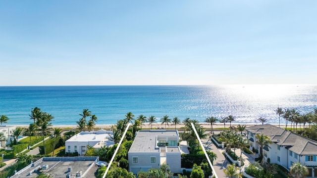 bird's eye view featuring a residential view and a water view