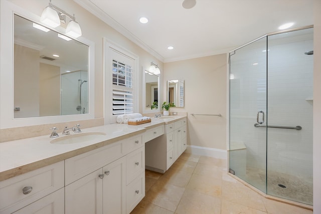 full bath featuring a sink, a stall shower, ornamental molding, and tile patterned flooring