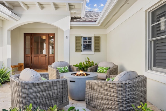 view of patio / terrace featuring a fire pit