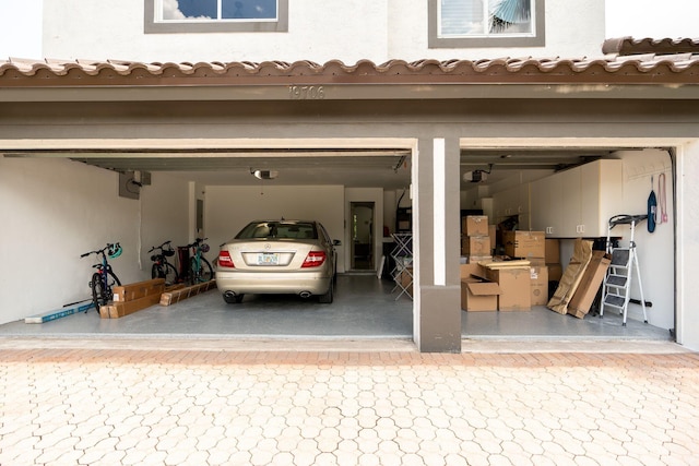 garage featuring a garage door opener