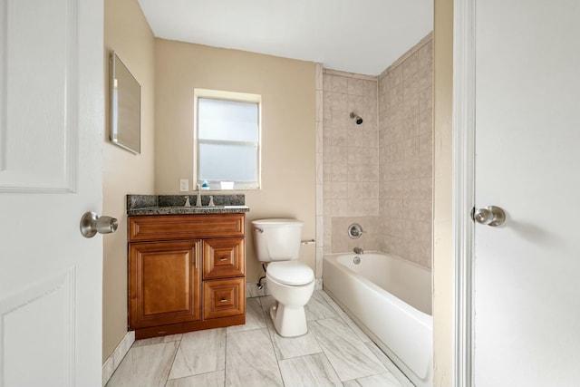 bathroom with vanity,  shower combination, and toilet