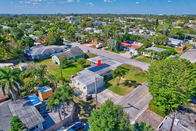 birds eye view of property with a residential view