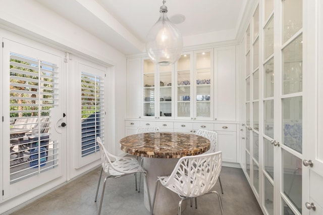 13408 55th St S, Wellington, FL 33449 - dining space with concrete floors and french doors