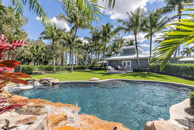 13408 55th St S, Wellington, FL 33449 - view of swimming pool featuring a fenced in pool, french doors, and a yard