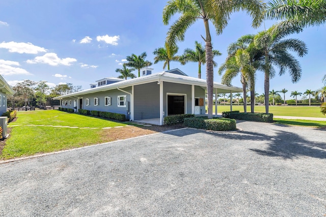 13408 55th St S, Wellington, FL 33449 - view of front of property with a front yard