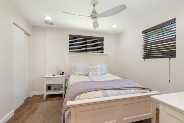 13408 55th St S, Wellington, FL 33449 - bedroom with recessed lighting, dark wood-type flooring, baseboards, a ceiling fan, and a closet