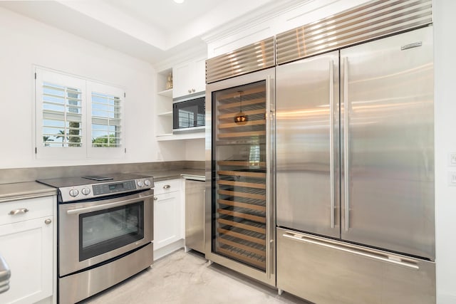 13408 55th St S, Wellington, FL 33449 - kitchen featuring marble finish floor, white cabinetry, built in appliances, and open shelves