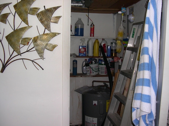 utility room featuring water heater