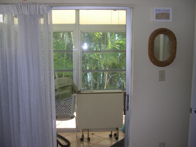 interior space with tile patterned floors