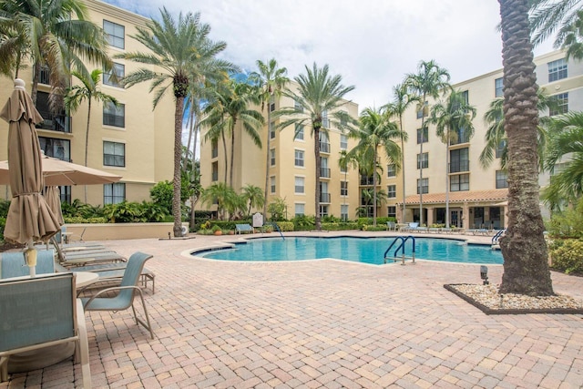 pool featuring a patio area