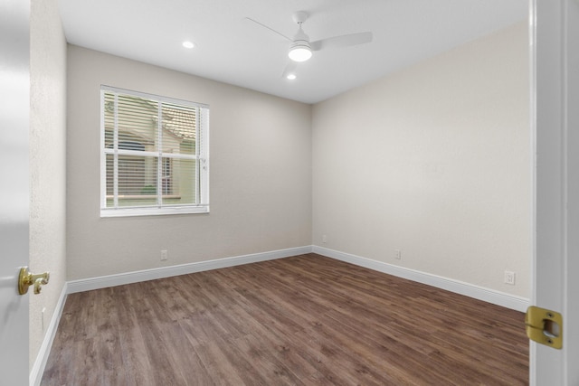 empty room featuring recessed lighting, baseboards, wood finished floors, and a ceiling fan