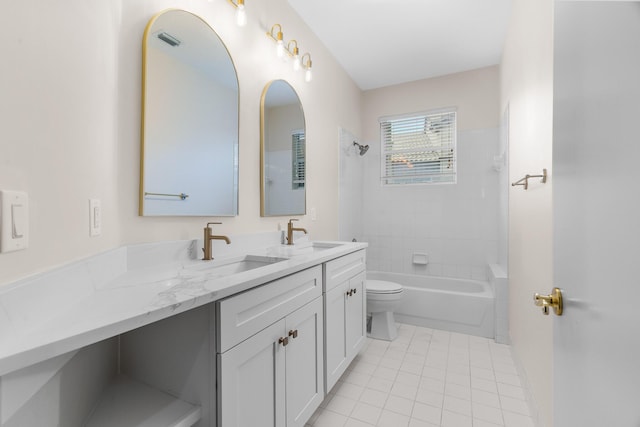 bathroom with double vanity, toilet, shower / tub combination, and a sink