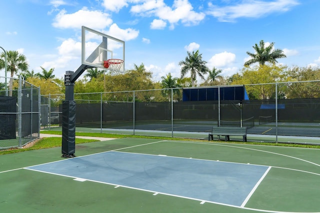 view of sport court with community basketball court and fence