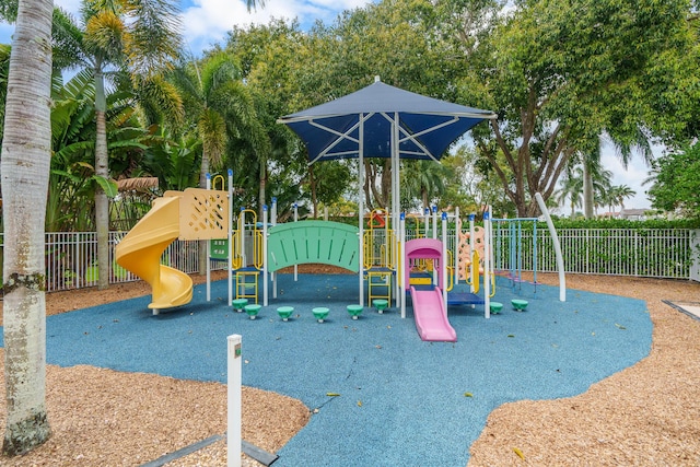 community jungle gym with fence