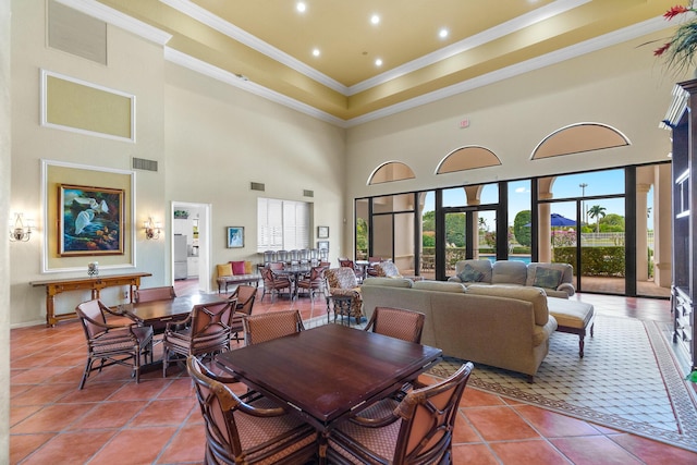 dining room with visible vents, baseboards, ornamental molding, recessed lighting, and tile patterned floors