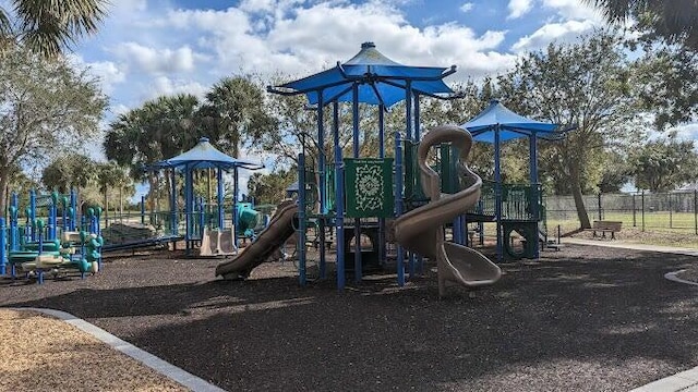 community playground featuring fence