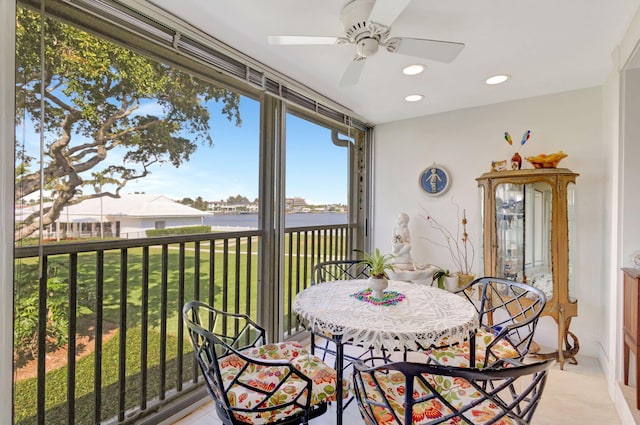 1 Church Ln Unit 111, North Palm Beach, FL 33408 - sunroom featuring a water view