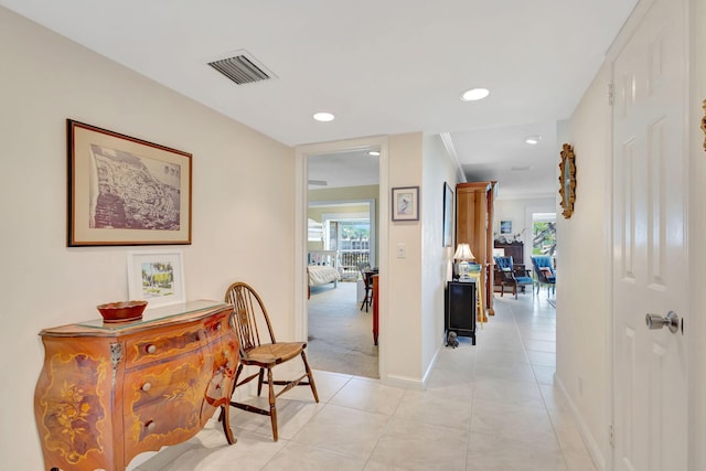 1 Church Ln Unit 111, North Palm Beach, FL 33408 - hallway featuring visible vents, baseboards, light tile patterned floors, recessed lighting, and light carpet