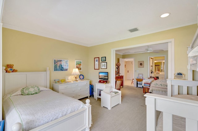 1 Church Ln Unit 111, North Palm Beach, FL 33408 - bedroom with crown molding, visible vents, and light colored carpet