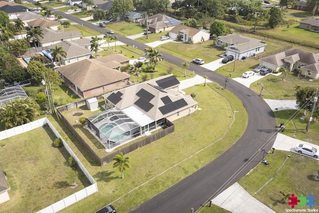 birds eye view of property with a residential view