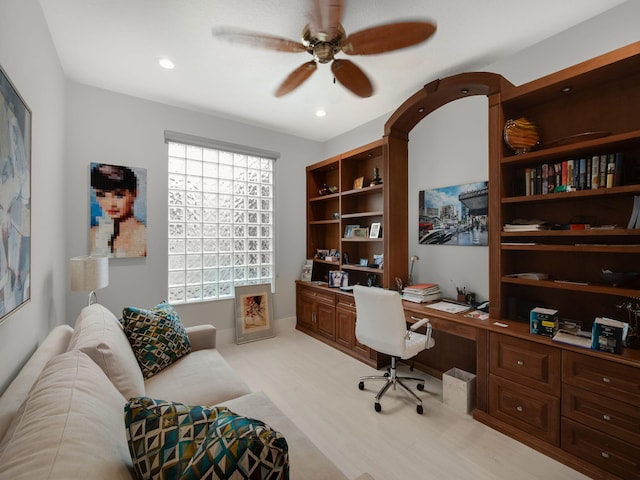 home office with recessed lighting, ceiling fan, and built in study area