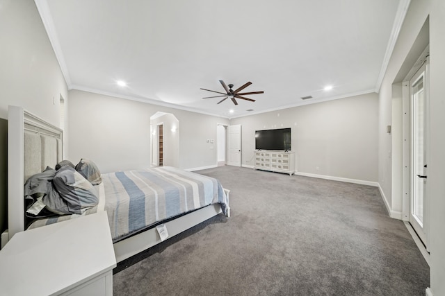 carpeted bedroom with baseboards, arched walkways, and crown molding