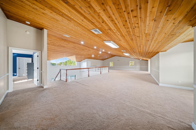 bonus room with lofted ceiling, a wealth of natural light, wood ceiling, and carpet floors