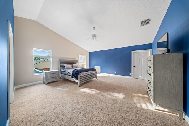 bedroom featuring visible vents, baseboards, carpet, and a textured ceiling