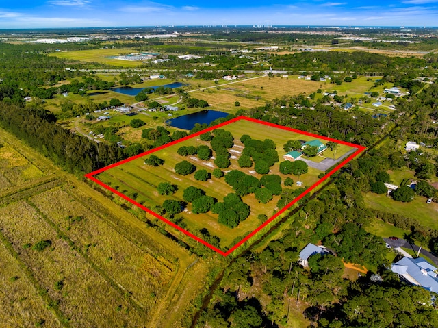 8686 Andrews Ave, Fort Pierce, FL 34945 - view of property location featuring a large body of water, property parcel outlined, and rural landscape