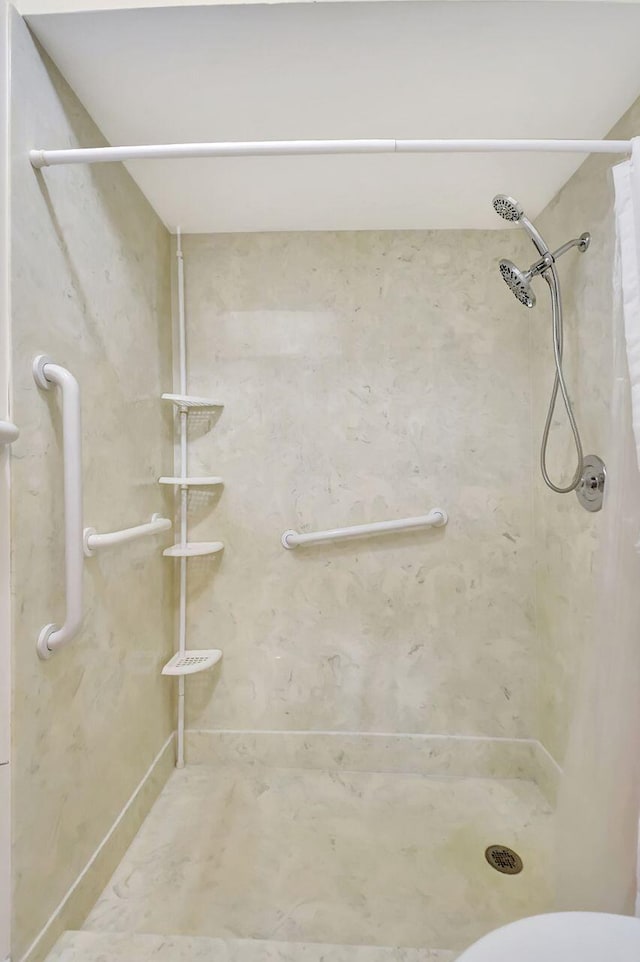 bathroom featuring a shower stall