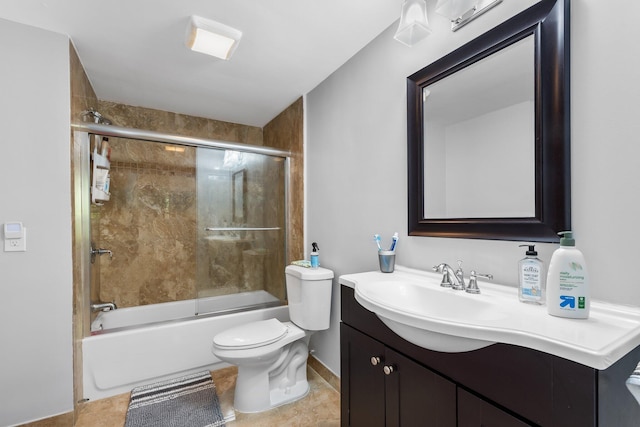 full bathroom featuring tile patterned flooring, toilet, vanity, and shower / bath combination with glass door