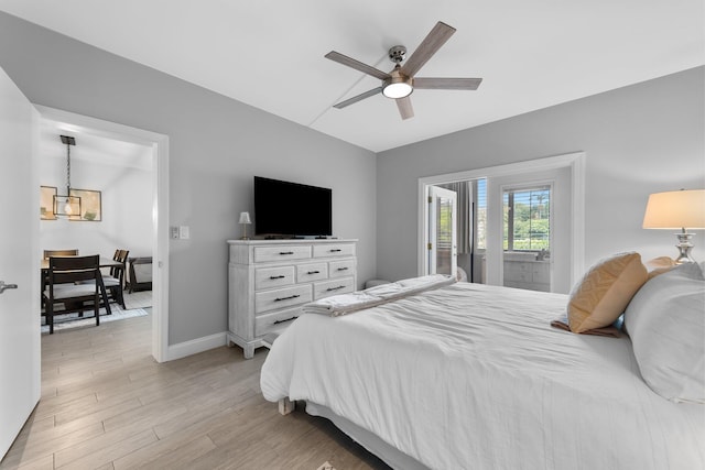 bedroom with light wood-type flooring, baseboards, and a ceiling fan