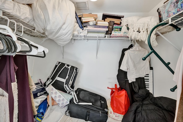 walk in closet with visible vents