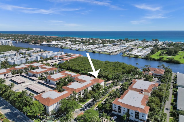 drone / aerial view featuring a water view