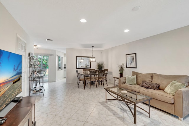 living area with recessed lighting