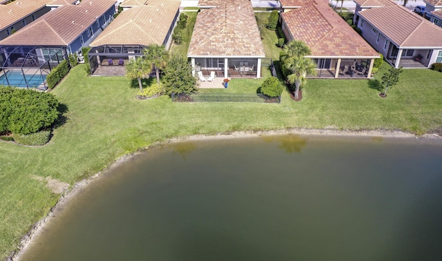 aerial view featuring a residential view and a water view