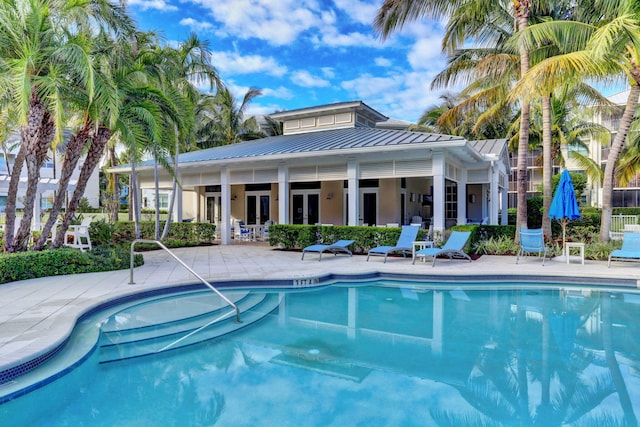 pool featuring a patio area and french doors