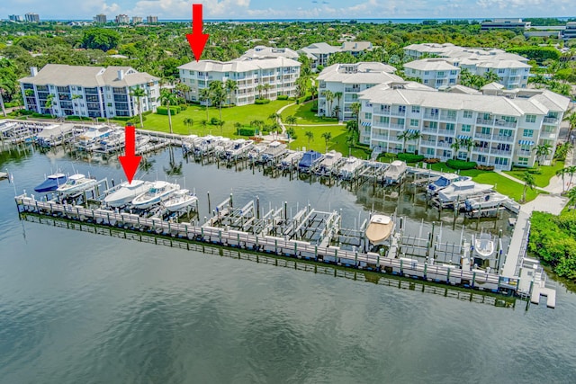 birds eye view of property featuring a water view