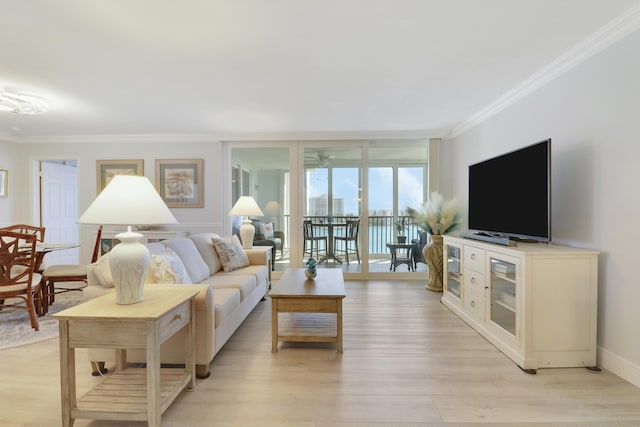 living room with ceiling fan, floor to ceiling windows, light wood-style flooring, and ornamental molding