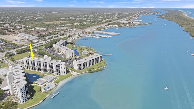 birds eye view of property with a water view