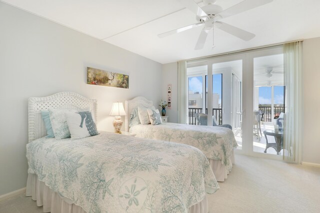 bedroom with access to exterior, light colored carpet, a ceiling fan, and baseboards