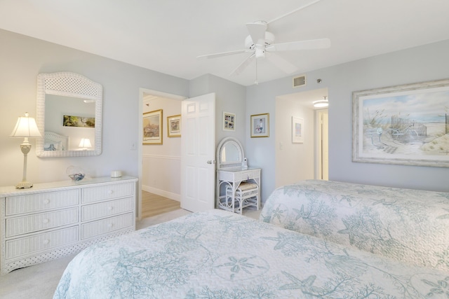 bedroom featuring visible vents and a ceiling fan